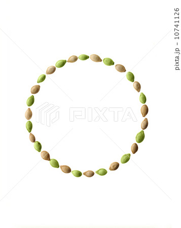 Studio shot of Pumpkin Seeds on white background 10741126