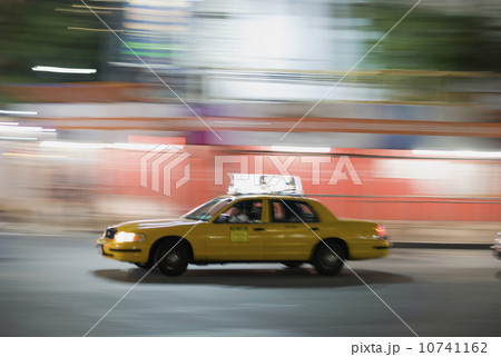 Taxi cab driving at night Taxi cab driving at night 10741162