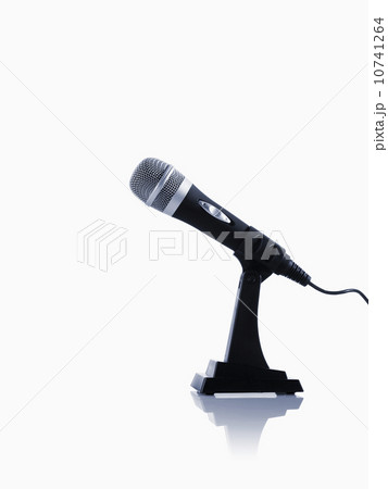 Studio shot of microphone on white background Studio shot of microphone on white background 10741264