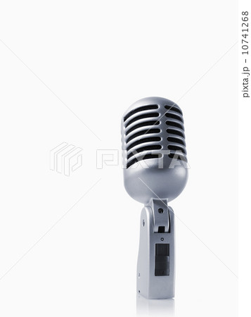 Studio shot of vintage-themed modern microphone on white background Studio shot of vintage-themed modern microphone on white background 10741268