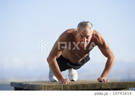 USA, California, Berkeley, Senior man exercising 10741614