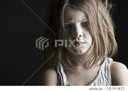 Studio portrait of sad girl (6-7) 10741825