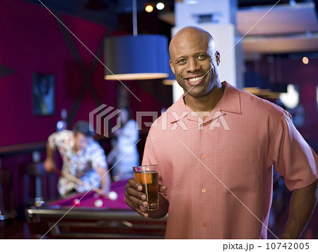 Men enjoying game of pool at bar 10742005