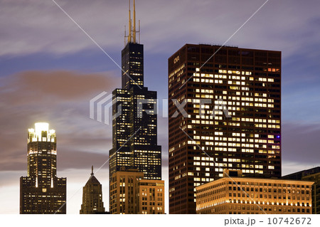 USA, Illinois, Chicago, Illuminated skyscrapers at dusk 10742672