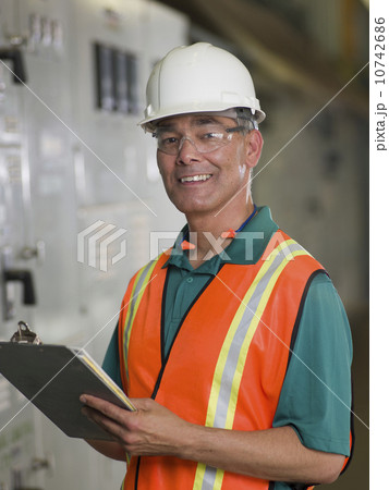 Portrait of industrial worker in hard hat 10742686