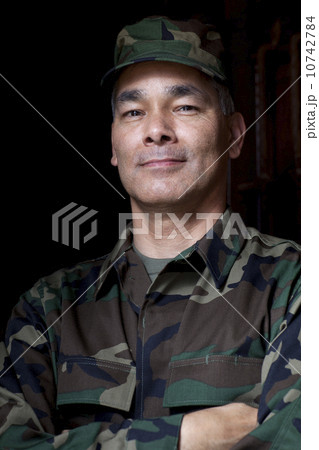 Portrait of mature man wearing military uniform 10742784