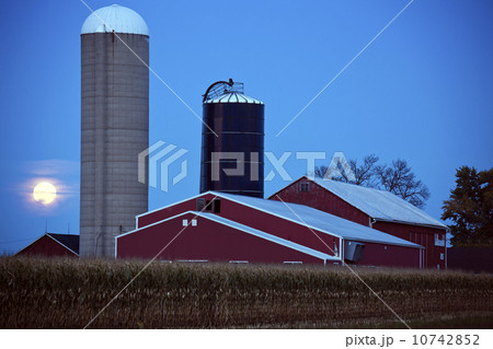 USA, Wisconsin, Moonrise over farm USA, Wisconsin, Moonrise over farm 10742852