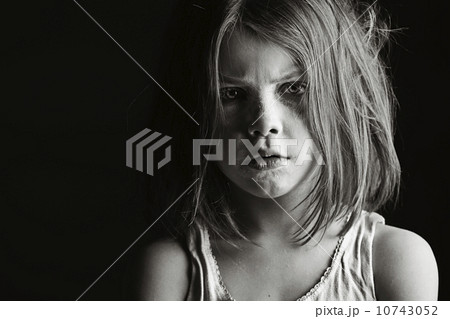 Studio portrait of serious girl (6-7) 10743052