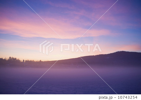 USA, Montana, Whitefish, Snow covered landscape at sunset USA, Montana, Whitefish, Snow covered landscape at sunset 10743254