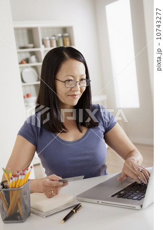 Woman shopping online from home 10743277