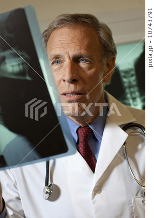 Doctor looking at x-ray 10743791