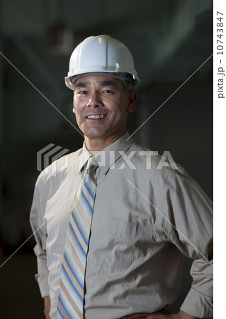 Portrait of male technician wearing hardhat Portrait of male technician wearing hardhat 10743847