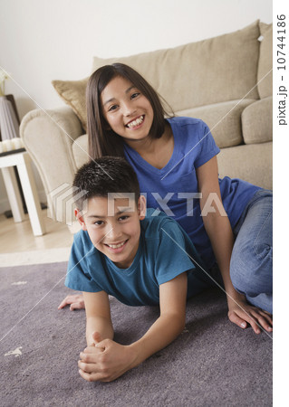 Sister and brother smiling 10744186