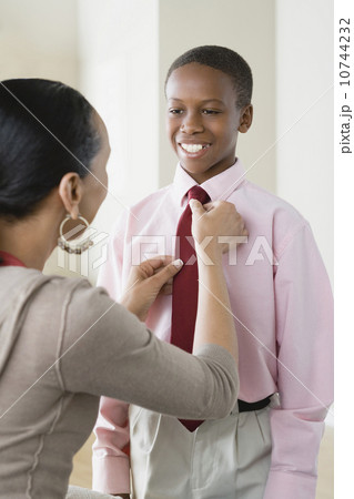 Mother adjusting Son's (12-13) tie Mother adjusting Son's (12-13) tie 10744232