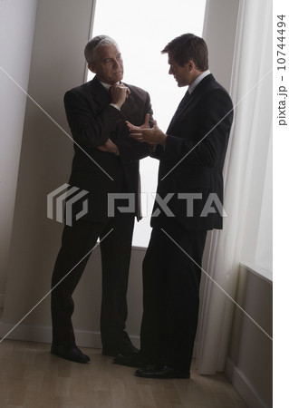 Two business men discussing in office Two business men discussing in office 10744494