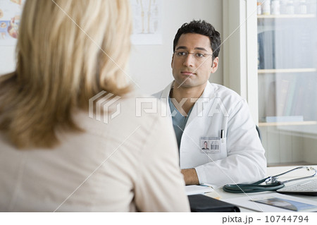 Doctor listening to patient 10744794