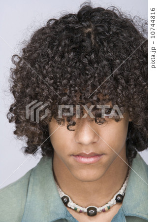 Portrait of teenage boy (14-15) 10744816