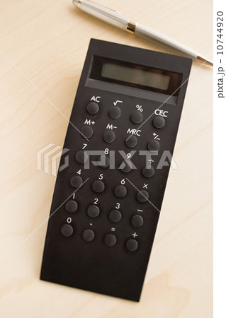 Calculator on desk Calculator on desk 10744920