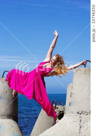 Young beautiful girl doing gymnastic  10746850