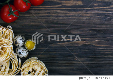 Ingredients for an Italian pasta recipe on rustic wood Ingredients for an Italian pasta recipe on rustic wood 10747351