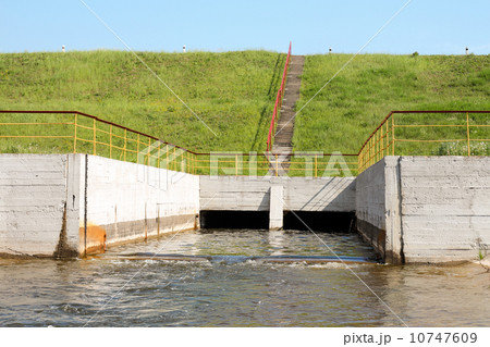 Floodgates of a small dam Floodgates of a small dam 10747609