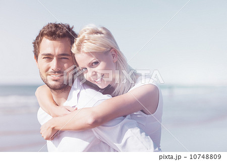 Couple in love on summer beach vacation Couple in love on summer beach vacation 10748809