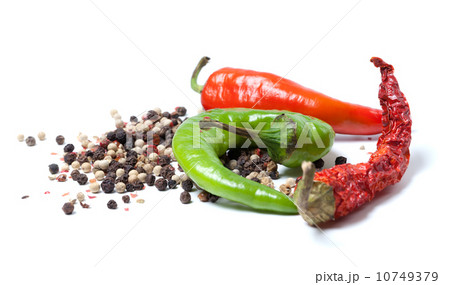 Mix of hot peppers on white background 10749379