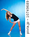 Isolated on blue sports woman 10749689