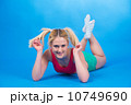 Isolated on blue cheerful woman 10749690