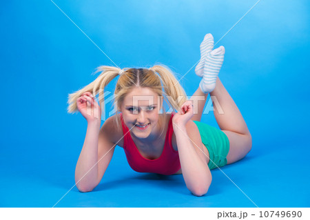 Isolated on blue cheerful woman 10749690