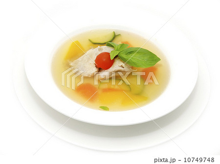 chicken soup on a table at restaurant 10749748