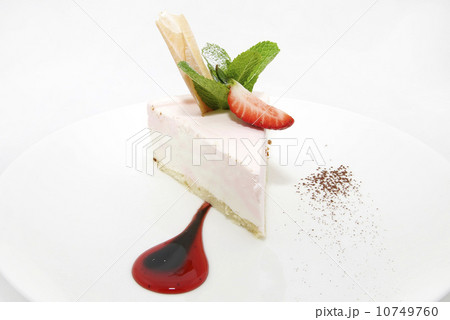 cream dessert garnished with mint on a white background 10749760