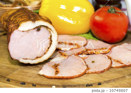 bacon on the table in a restaurant with sauce and vegetables bacon on the table in a restaurant with sauce and vegetables 10749807