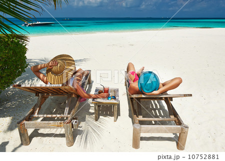 Couple on a beach at Maldives Couple on a beach at Maldives 10752881