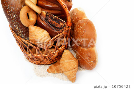 large variety of bread, still life isolate on a wooden table ove large variety of bread, still life isolate on a wooden table ove 10756422