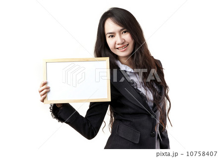 Business woman holding a blank white board Business woman holding a blank white board 10758407