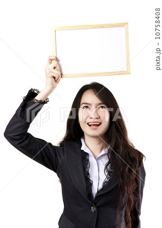Business woman holding a blank white board 10758408