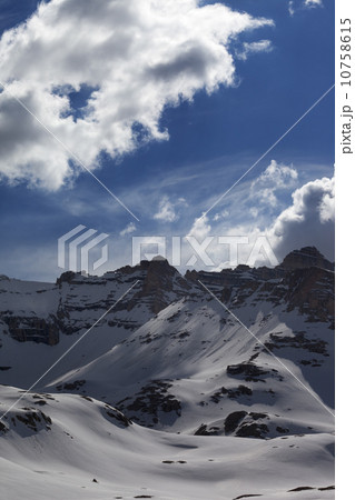 Snow mountains and blue sky with clouds 10758615