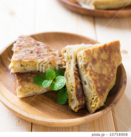 Pan fried stuffed bread murtabak 10758908