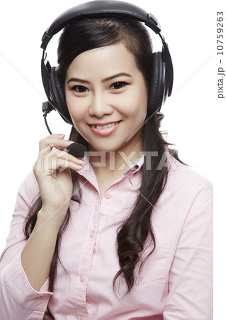 Portrait of happy smiling cheerful support phone operator in hea Portrait of happy smiling cheerful support phone operator in hea 10759263