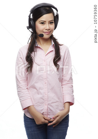 Portrait of happy smiling cheerful support phone operator in hea Portrait of happy smiling cheerful support phone operator in hea 10759360