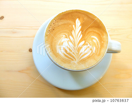 Latte art coffee on wooden table 10763637