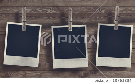 Blank Photo frame on wooden background Blank Photo frame on wooden background 10763884