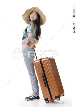 Exciting Asian woman drag a luggage 10768902