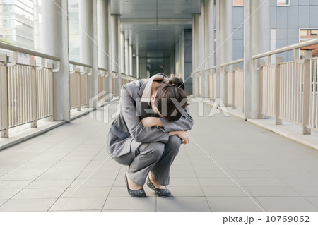 Business woman feel helpless and sadness 10769062