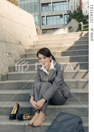 Sad business woman feel helpless 10769101