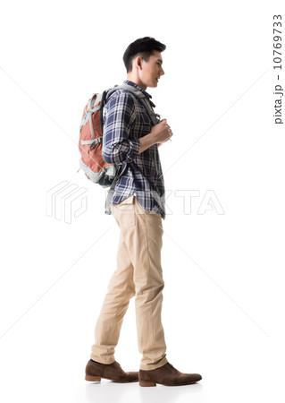 Side view of young Asian backpacker Side view of young Asian backpacker 10769733