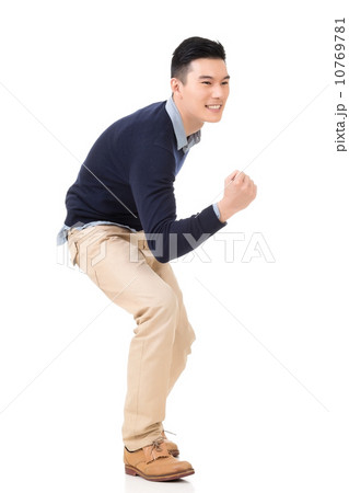 Excited Asian young man 10769781