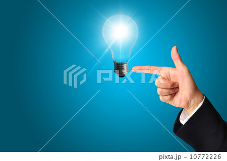 Business man touching light of idea Business man touching light of idea 10772226