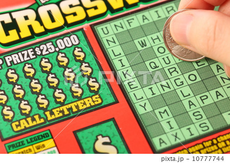 Scratching lottery ticket. 10777744